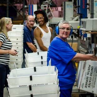 MDI employees in warehouse