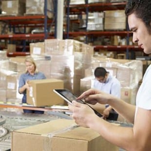 warehouse worker using iPad