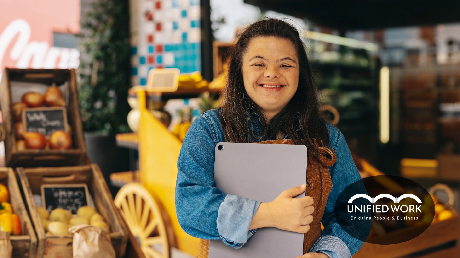 young woman with Down syndrome working her job at a market