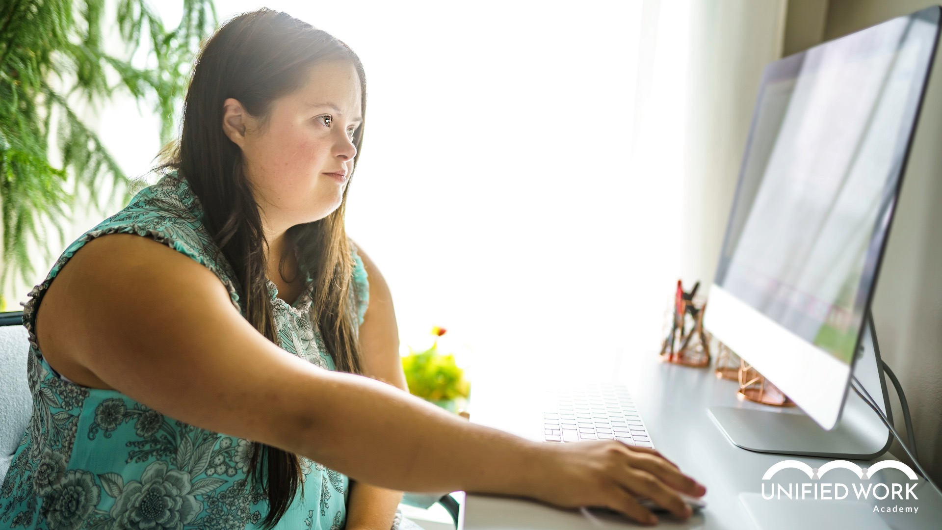 Young woman with a disability learning soft skills online with Unified Work academy